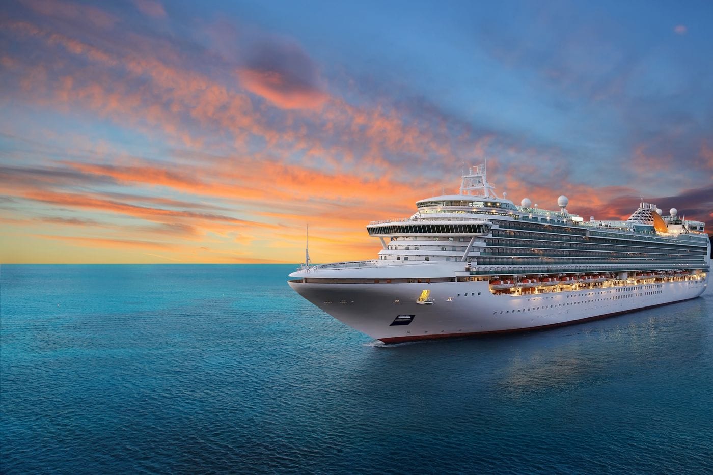 Cruise ship flag flying at sea