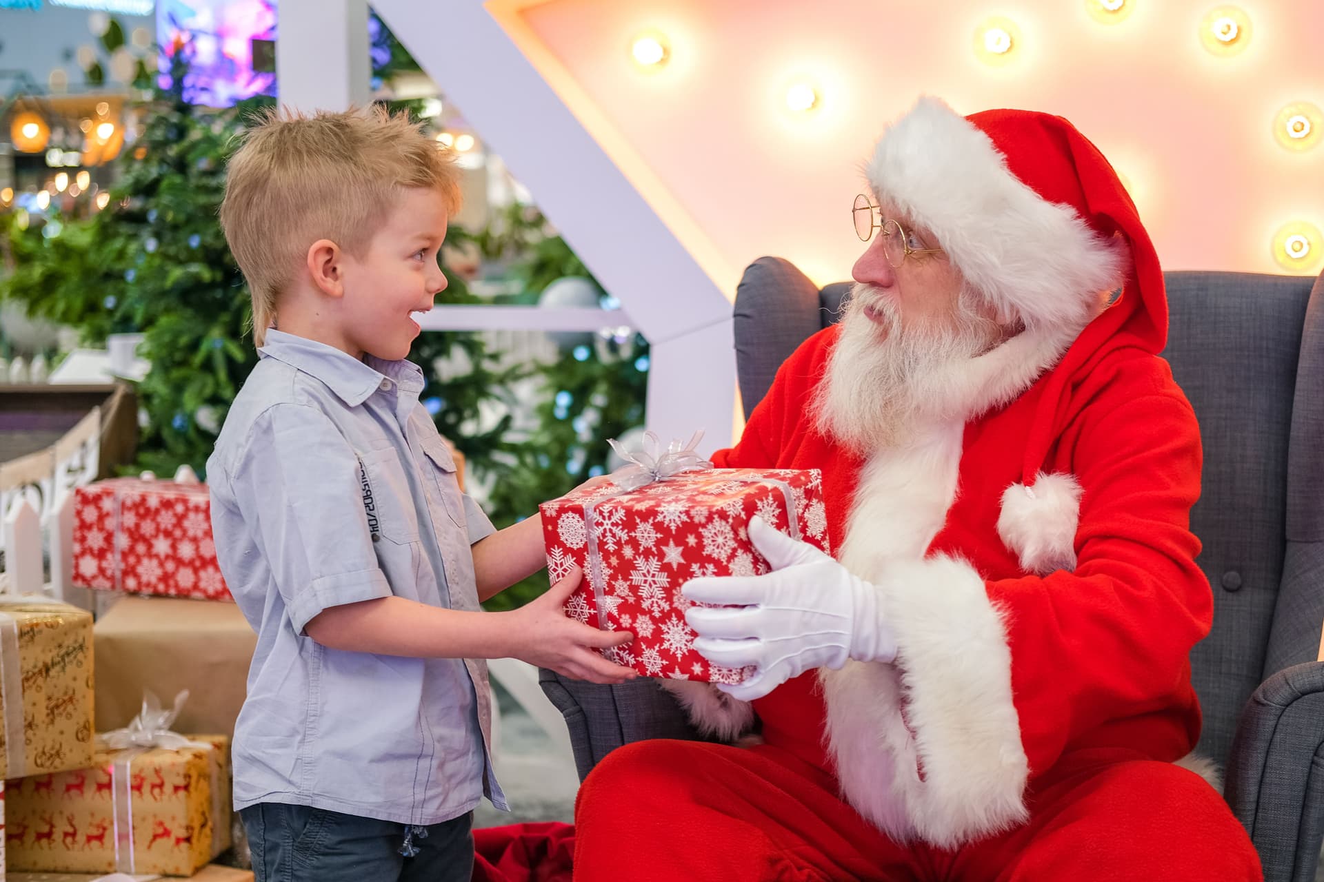 Children waiting in line to see department store Santa