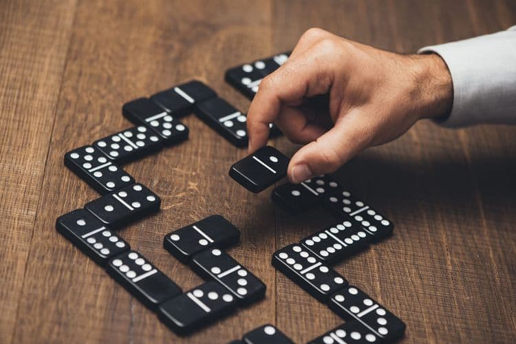 The History of Dominoes—A Game of Strategy and Chance