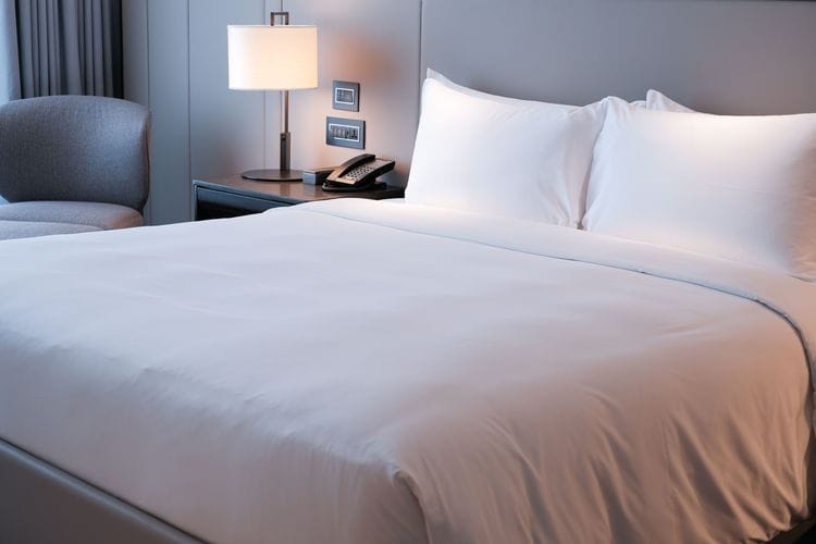 Why Hotel Beds Have So Many Pillows
