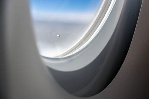 Why Airplane Windows Have Tiny Holes in Them
