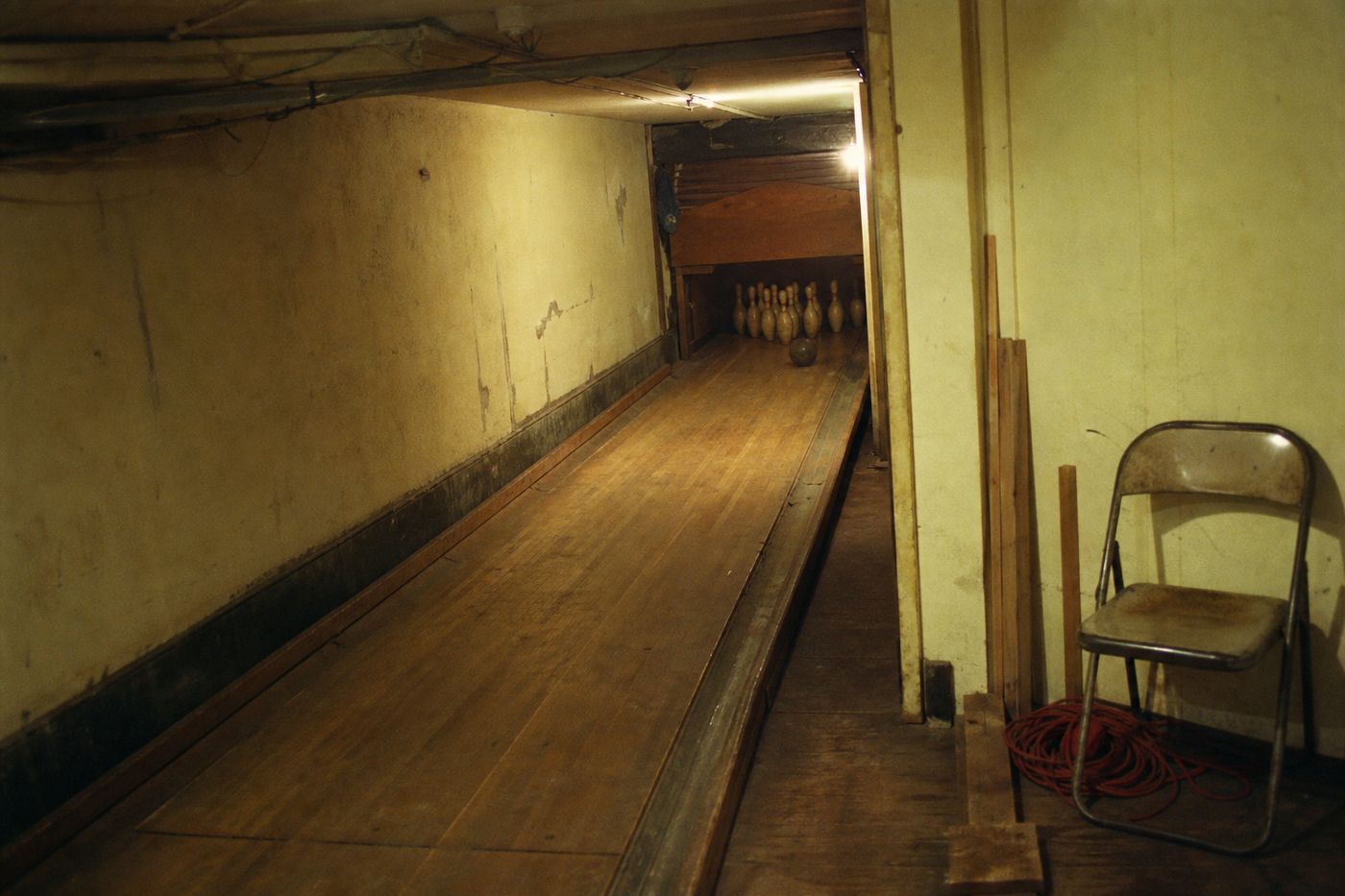 Dim basement bowling lane