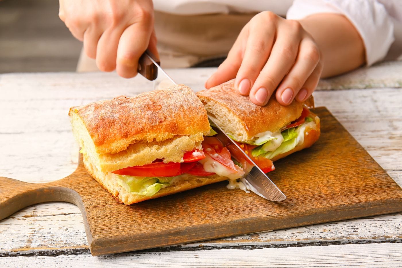 Sandwich on a wooden cutting board