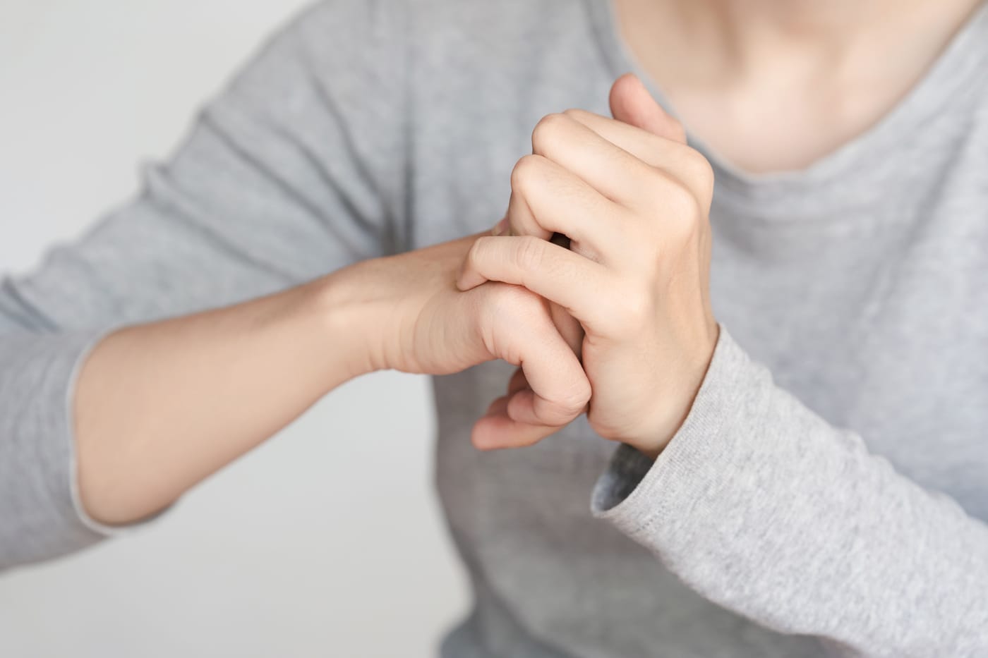 Person cracking knuckles